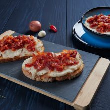 Mashed beans spread with garlic vegetable oil, with a topping of sauteed onions and tomato paste (Romanian: fasole batuta), an all-time favorite during lent and other times of religious feasting